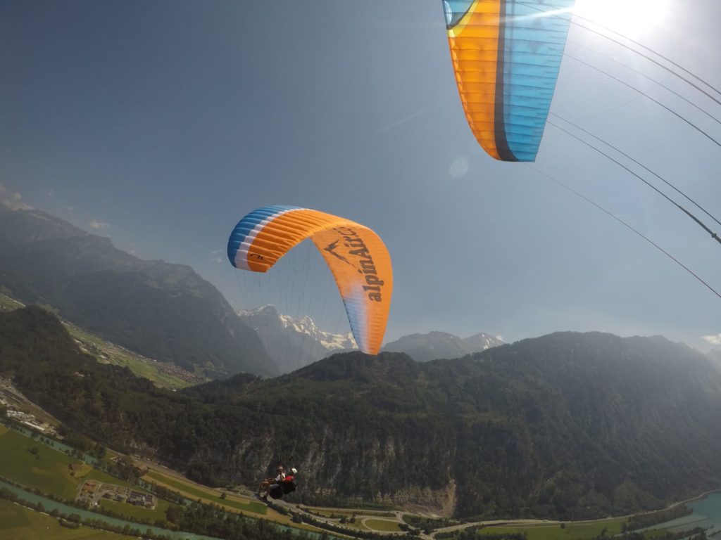 Soar into the Sun A stunning Interlaken paragliding perspective (2)